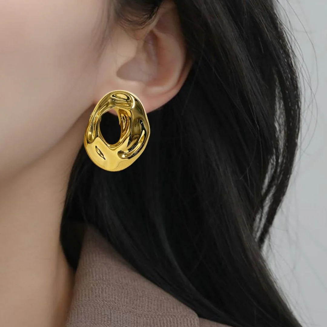 Fluid Hollow Oval Gold Statement Earrings - Image 5