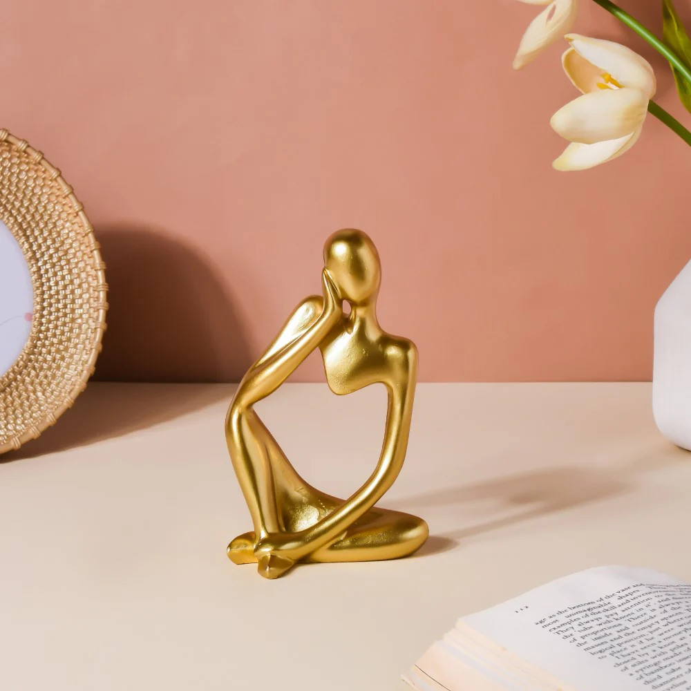 Gold Sitting Showpiece
