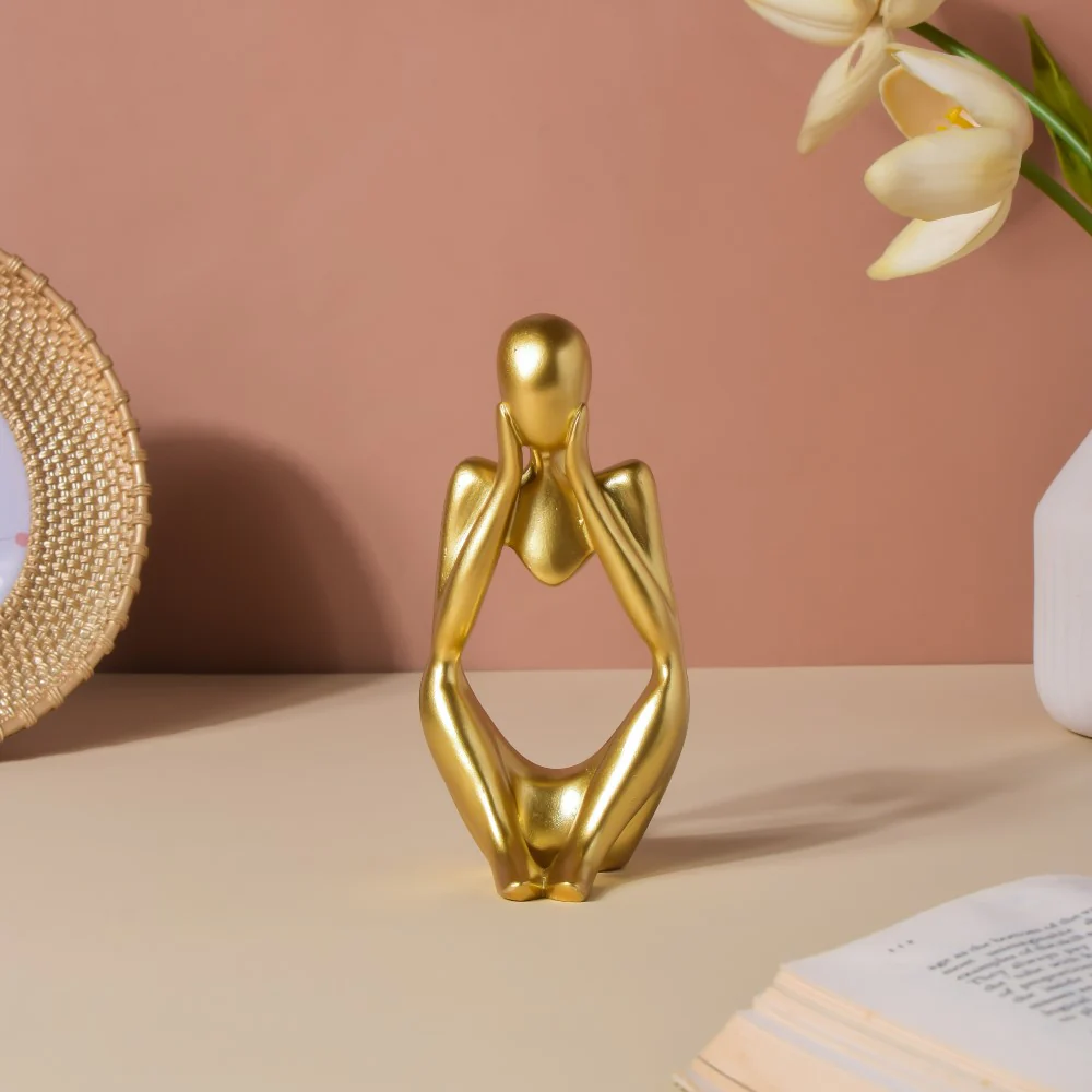 Gold Sitting Showpiece In Thought