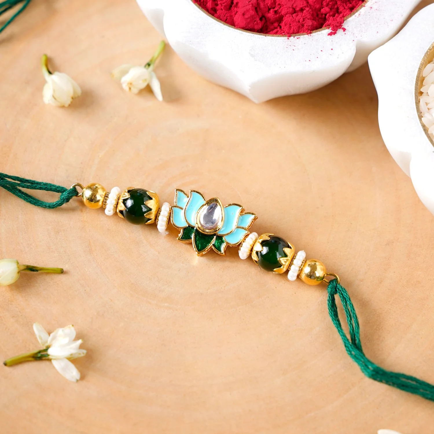 Green Kundan Lotus Rakhi Gift Set For Bhaiya Bhabhi - Image 2