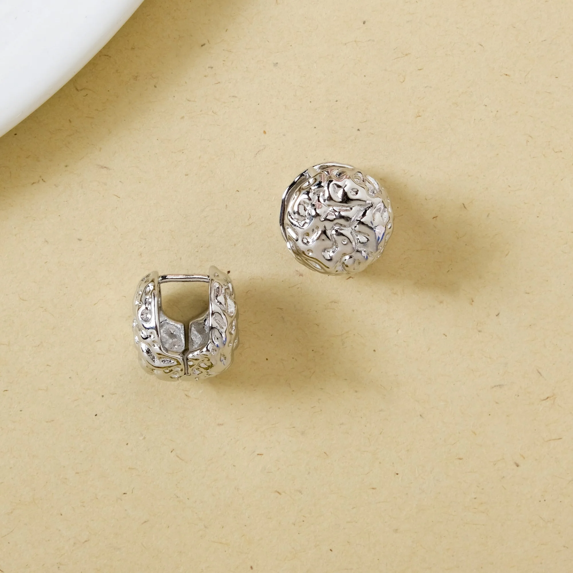 Hammered Metal Silver Huggie Earrings - Image 5