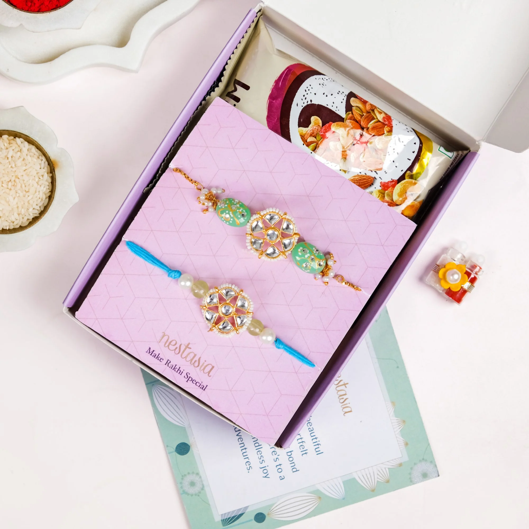 Serene Kundan Blue Rakhi Bracelet Gift Set - Image 5