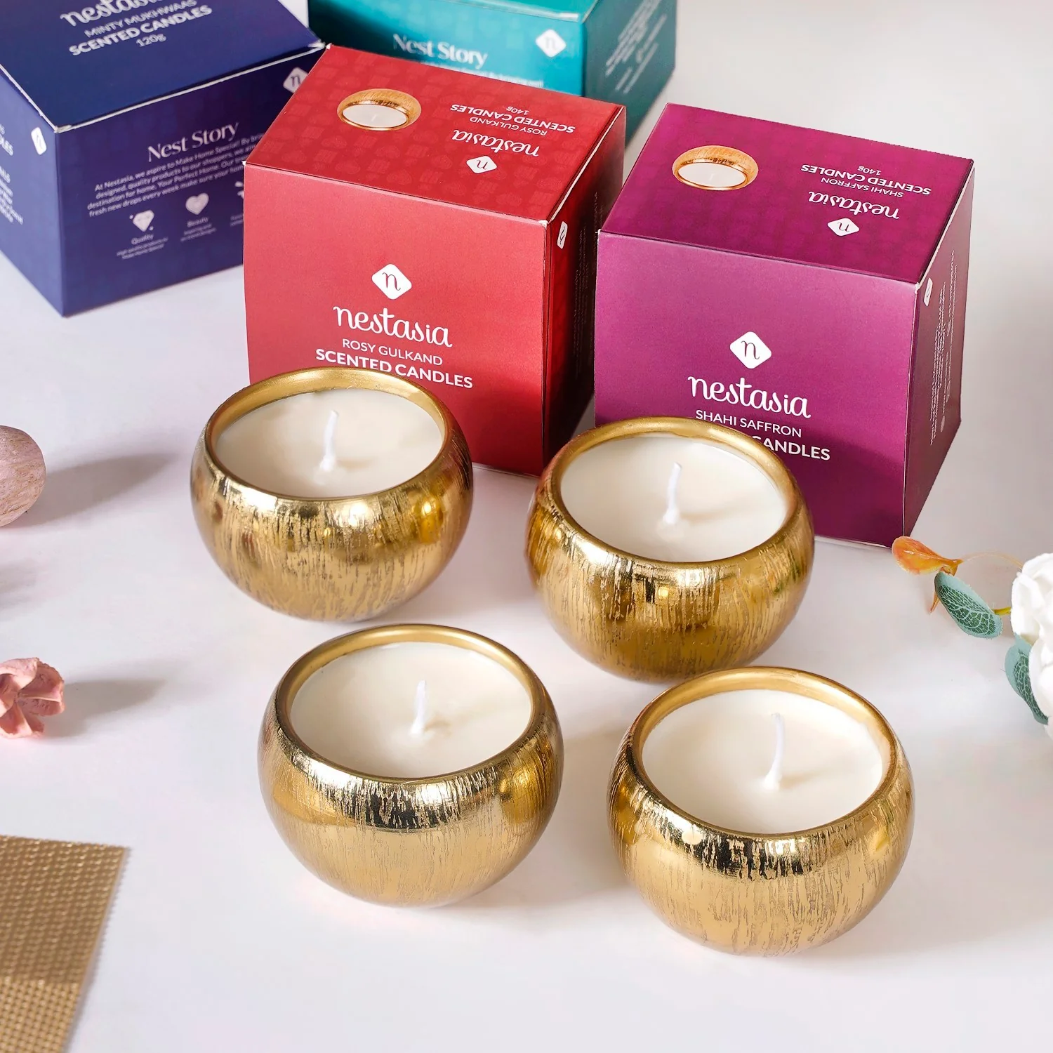 Set Of 4 Festive Delights Gold Scented Candles