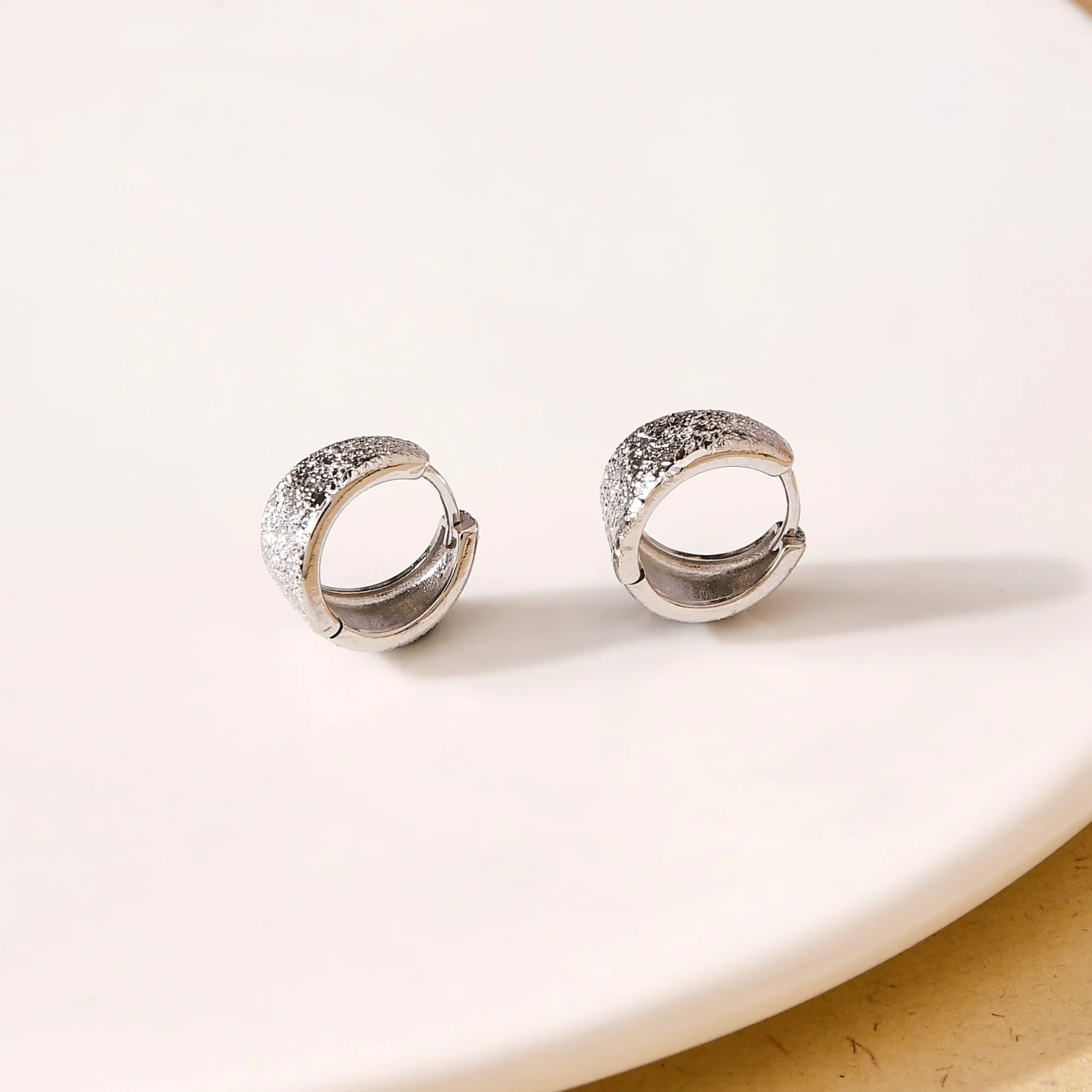 Sleek Textured Silver Hoop Earrings - Image 2