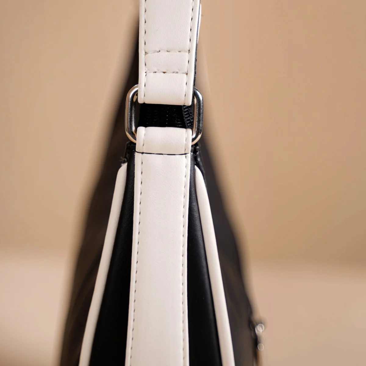Sleek Urbanite Black Moon Handbag - Image 10